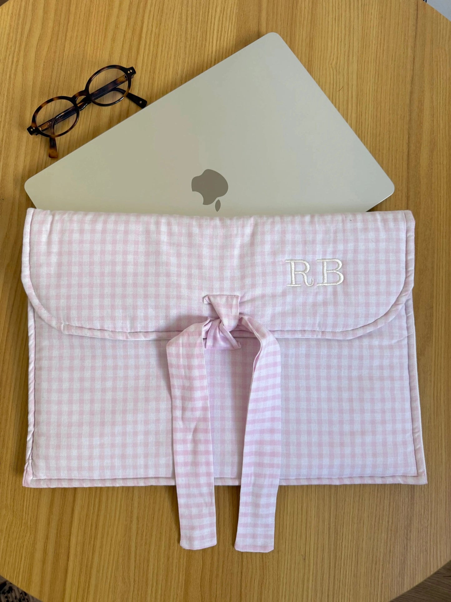 Housse d'ordinateur rose de lecture